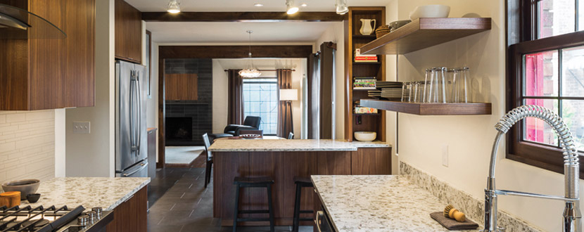 The effort to replicate Tudor details really pays off, with sculpted plaster door trims and windows and doors designed to match the originals.