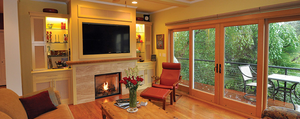 This room and the adjacent dining room, kitchen and all also benefit from new poplar flooring with an unusual and colorful patina. Repainting in all rooms, in some cases with lighter-colored paint, made for a refresh of all of the main floor common areas.