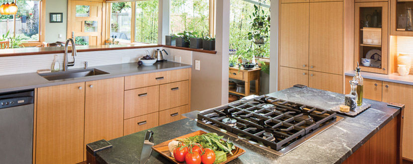 What makes these truly custom, though, is the addition of sapele to the cabinets and building the entire island in that same mahogany.