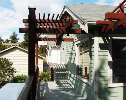After:  A comfortable outdoor entertaining area with custom details and durable materials.