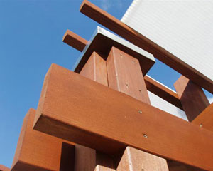 After:  A comfortable outdoor entertaining area with custom details and durable materials.