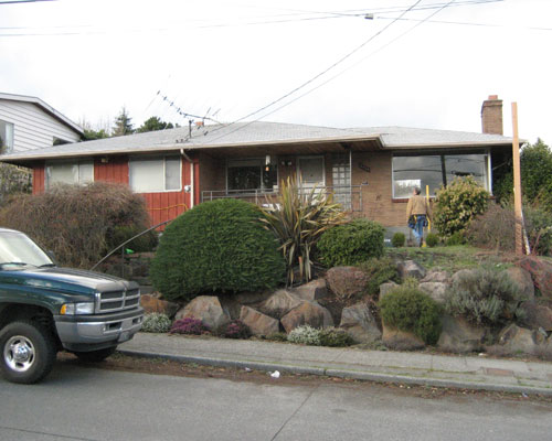 Before: Classic 50s rambler with brick, in need of a remodel Seattle rambler