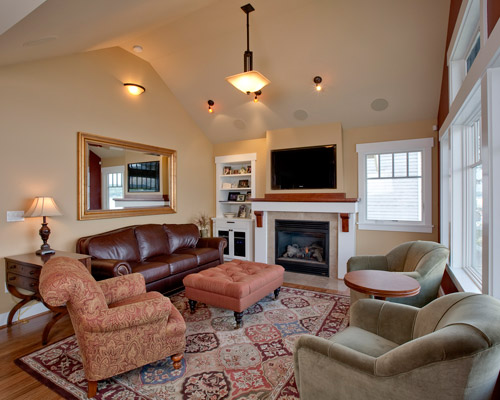 The TV in the living room is a high-tech center, with cutting-edge whole-house music, lighting and security controls