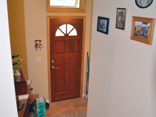 The new roof also opened the possibility of adding a new window to the stairwell, and a mudroom entry with room for storage