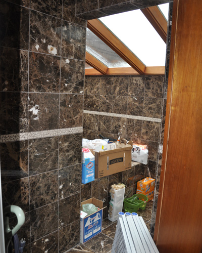 More importantly, this giant spa was useless on the main floor for a family with young kids. The 200sf room became a place for the cat box