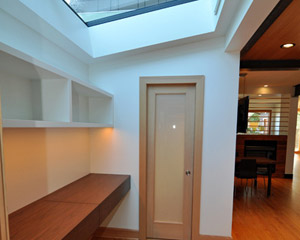 From the laundry room, you can see the powder room door