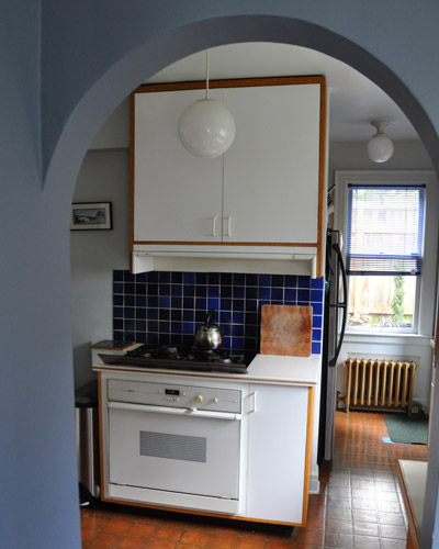 Before:  Poorly remodeled in the '70s with white melamine cabinets and finishes just wrong for this stately home