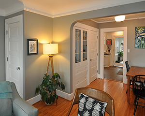Main floor with new cabinets and door to basement