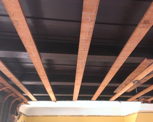 The big surprise came at demolition.  We intended to remove the plaster and cove, install insulation and replace with new sheetrock and cove.  As the plaster came off it became clear that the plaster had been installed not directly over framing, but over top of original finished fir ceilings and the walls at the stairwell.  It was a discovery that spurred a change in plan