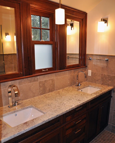 The entry door is still the same from the master bedroom, but what a difference inside!   Double sinks with their own custom medicine cabinets and a sweet new Cherry Creek window to share