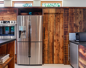 view of kitchen with stove and refrigerator